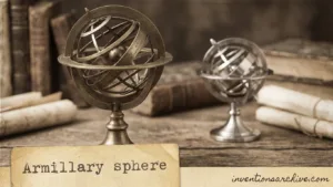 An armillary sphere with intertwined metallic rings and a stand, illustrating the ICAT.