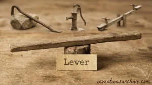 A lever made of wood on a wooden surface with a small sign labeled 'Lever'.
