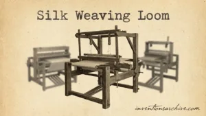 A silk weaving loom with wooden parts and woven fabric on it.