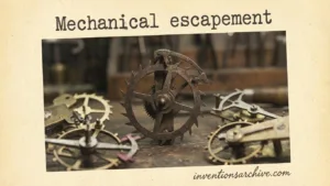 A close-up of various mechanical escapements with gears and levers in a workshop
